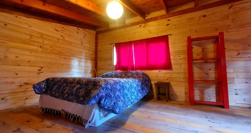 Postel nebo postele na pokoji v ubytování Casita Arco Iris