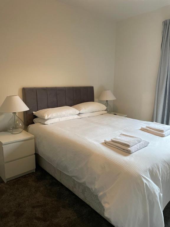 Cama ou camas em um quarto em Woodlands Hall Hotel