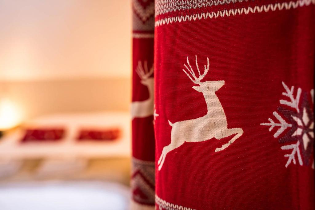 Postel nebo postele na pokoji v ubytování Le Bois des Neiges Charmant chalet authentique à 5 mn de Gérardmer