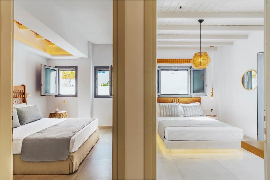 Postel nebo postele na pokoji v ubytování Andromeda Residences