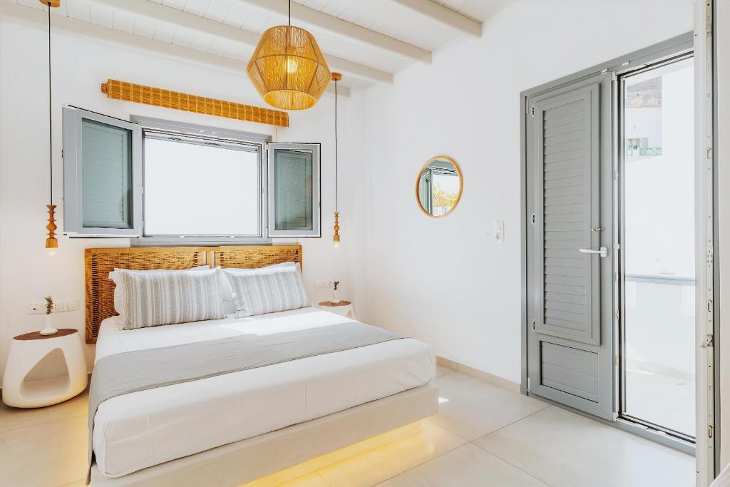 Postel nebo postele na pokoji v ubytování Andromeda Residences