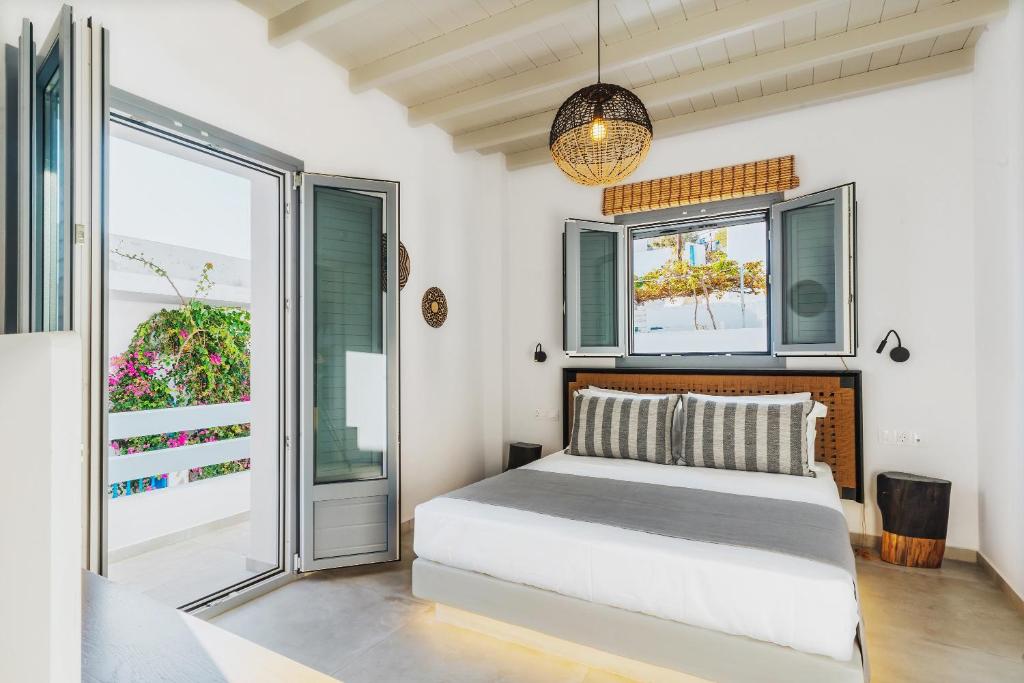 Postel nebo postele na pokoji v ubytování Andromeda Residences