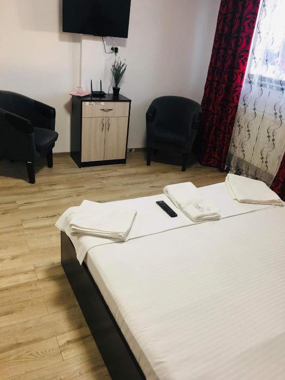 Postel nebo postele na pokoji v ubytování Casa Famous