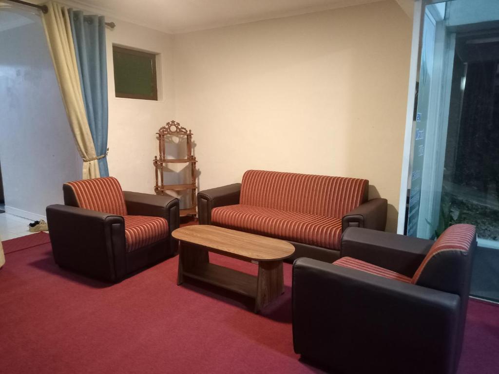 Posezení v ubytování New Mount Villa