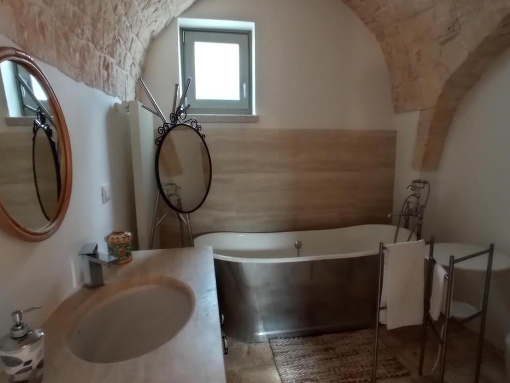 Koupelna v ubytování Masseria - Trulli Genius Loci Dimore