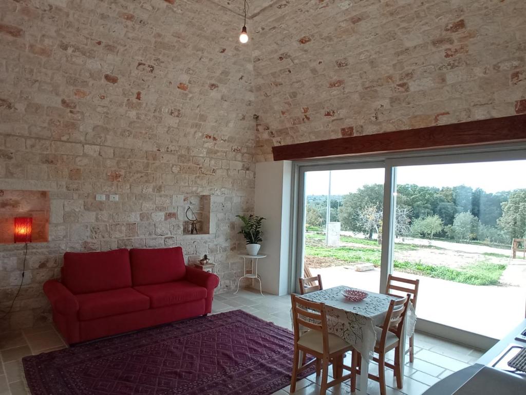 Posezení v ubytování Masseria - Trulli Genius Loci Dimore