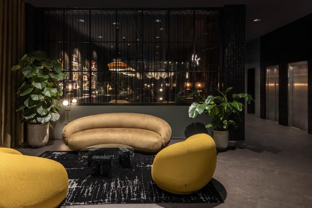 Posezení v ubytování Hotel ROMY by AMANO