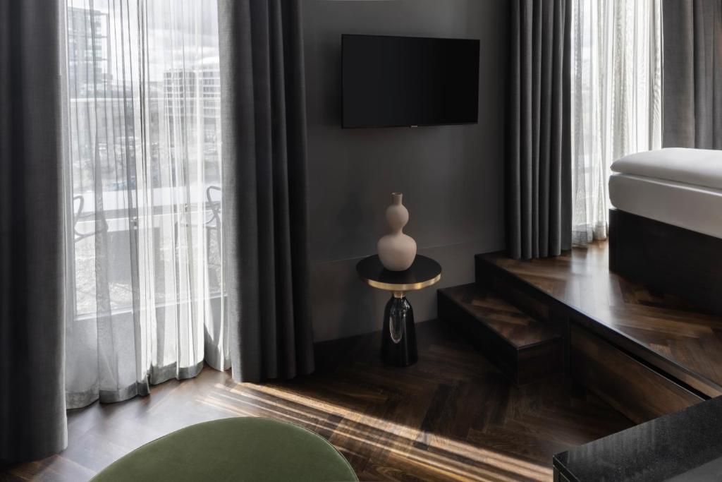 Postel nebo postele na pokoji v ubytování Hotel ROMY by AMANO