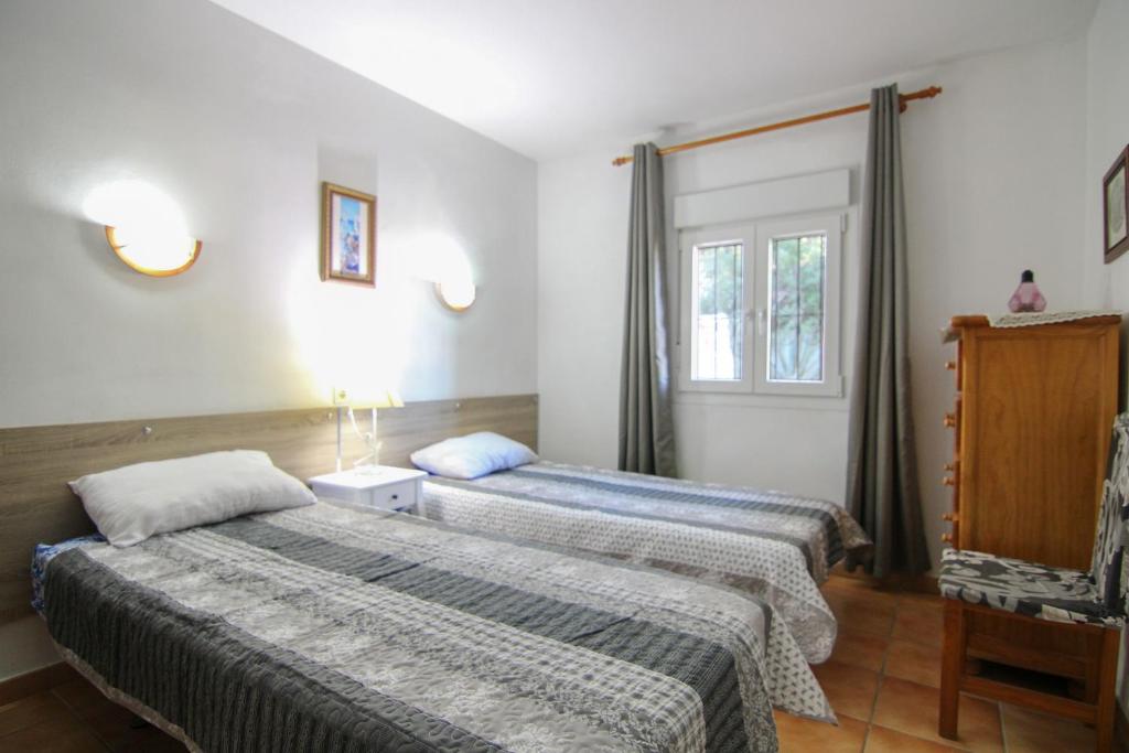 Postel nebo postele na pokoji v ubytování Villa Maryvilla 0210