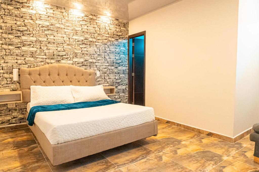 Postel nebo postele na pokoji v ubytování Hotel Salinero - Zipaquirá