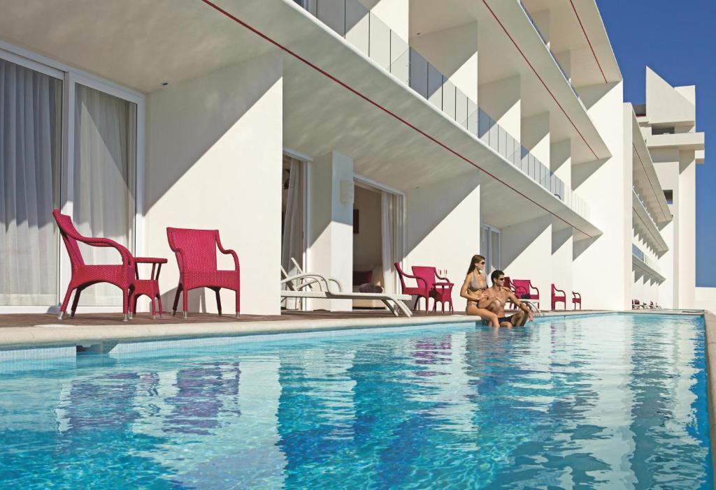 Piscina en o cerca de Secrets Huatulco Resort & Spa