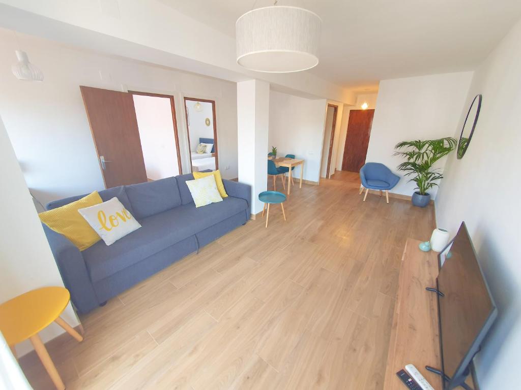 A television and/or entertainment centre at Apartamento Arenal II