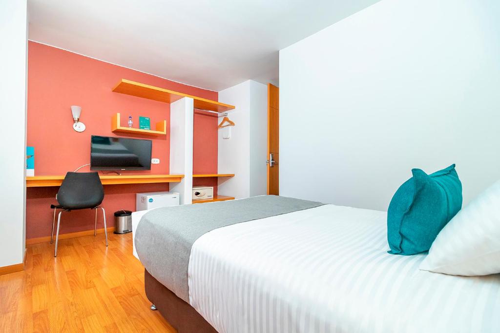 Postel nebo postele na pokoji v ubytování Hotel Abitare 56