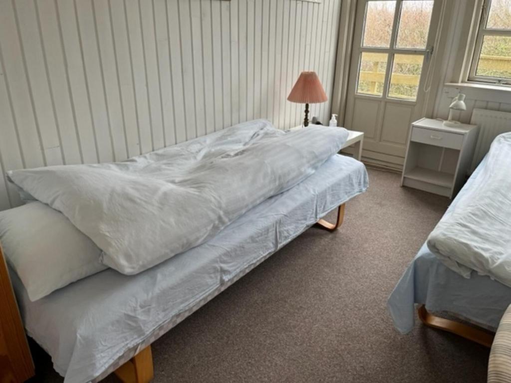 Postel nebo postele na pokoji v ubytování Munkebo B&B, Thy