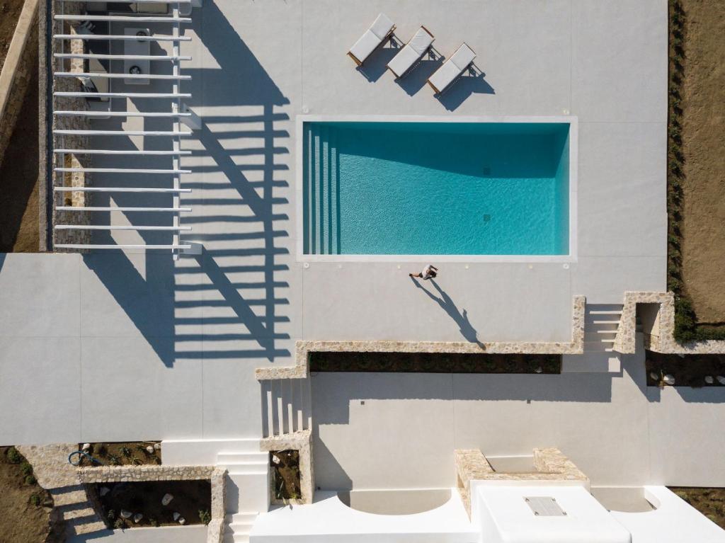 a view from above of a building with a pool at Villa Conza Mykonos in Agios Ioannis Mykonos