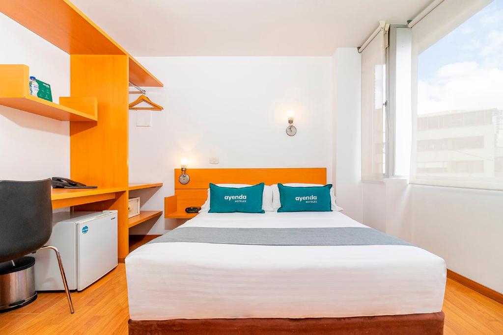 Postel nebo postele na pokoji v ubytování Hotel Abitare 56