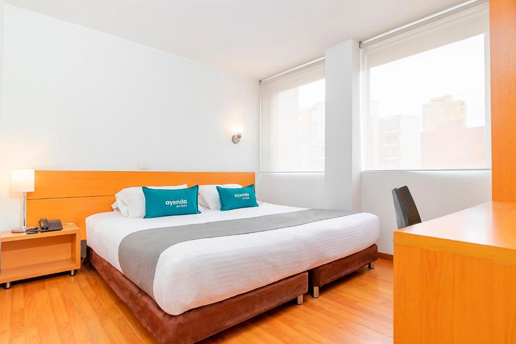 Postel nebo postele na pokoji v ubytování Hotel Abitare 56