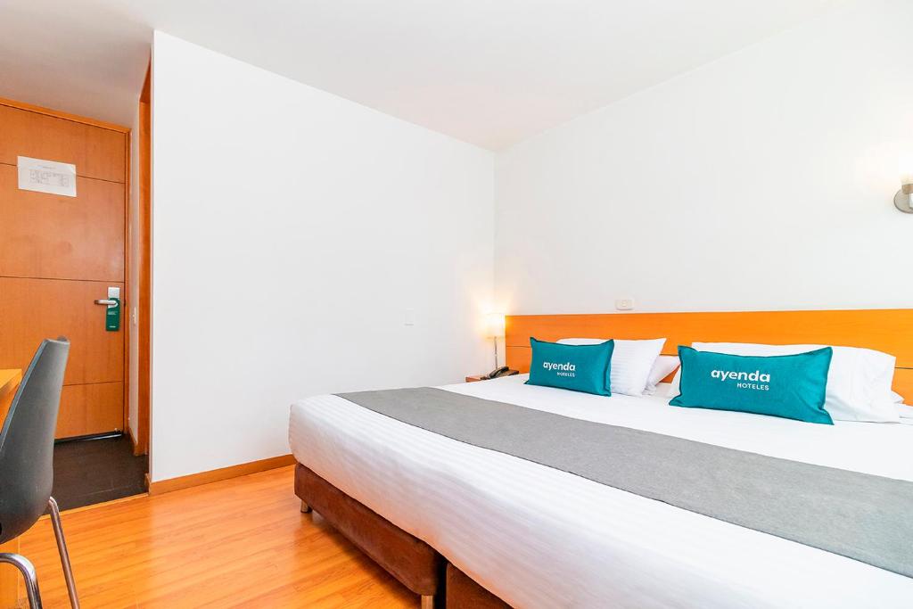 Postel nebo postele na pokoji v ubytování Hotel Abitare 56