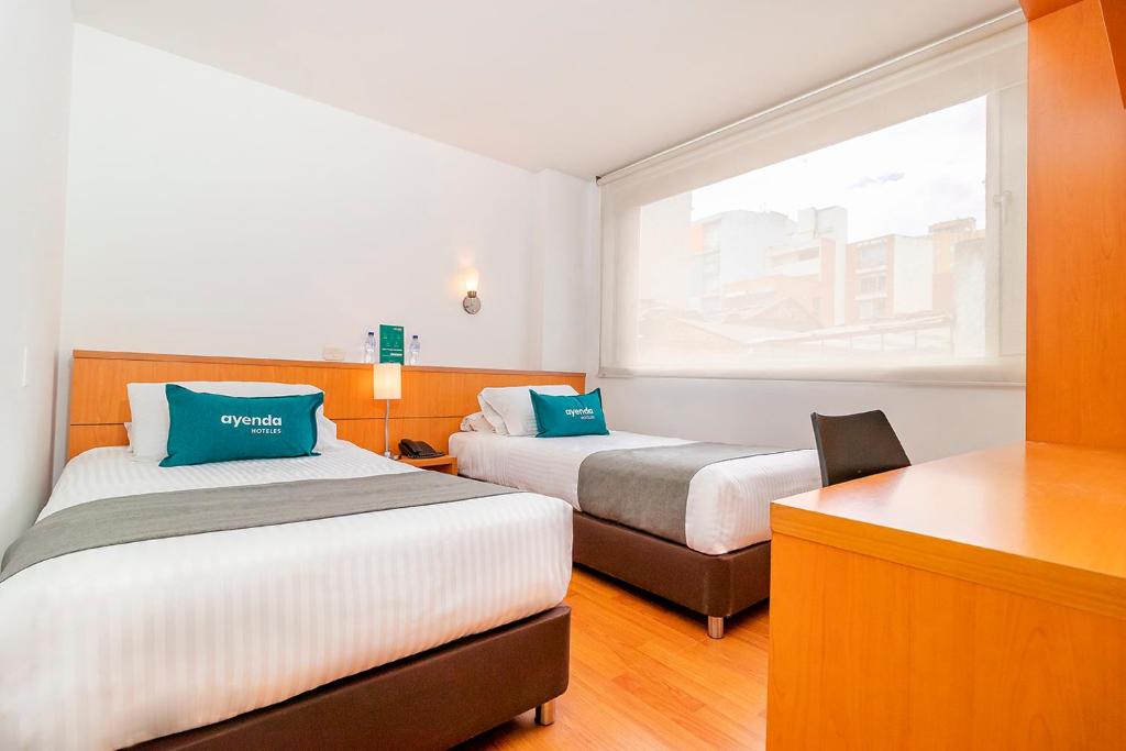 Postel nebo postele na pokoji v ubytování Hotel Abitare 56