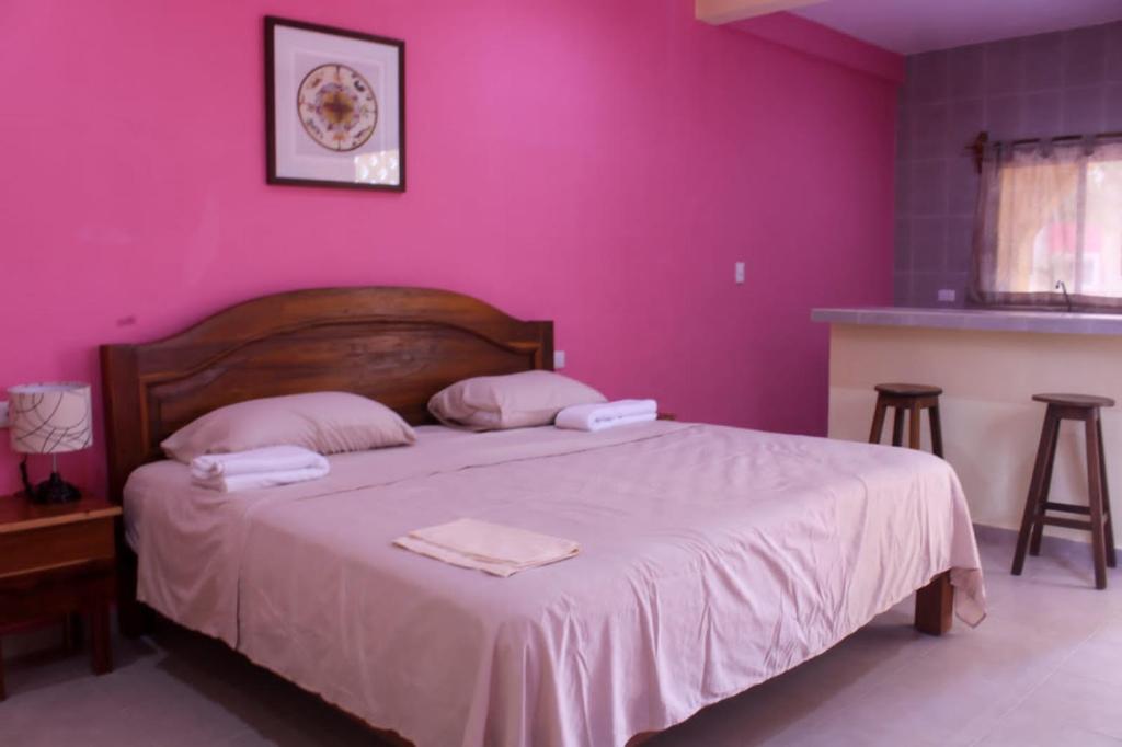 Postel nebo postele na pokoji v ubytování Ecohotel Shalom