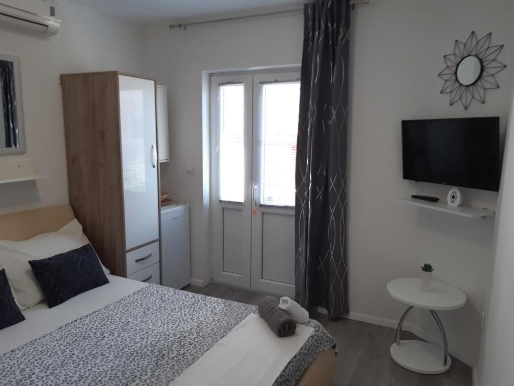 Postel nebo postele na pokoji v ubytování Guest House Sonja