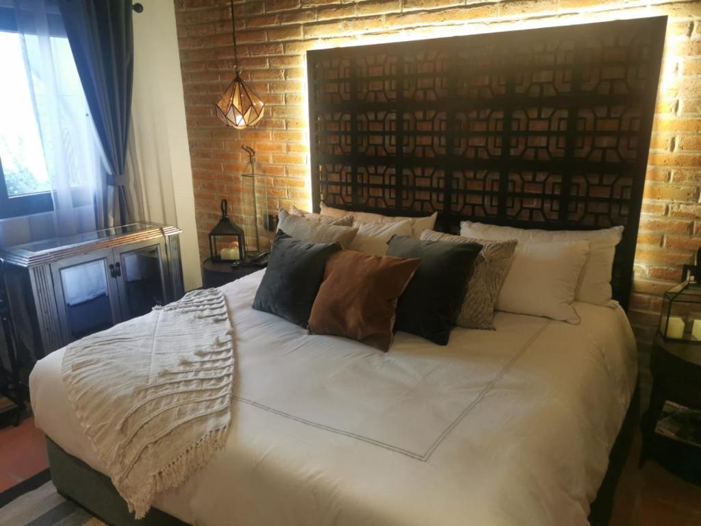 Postel nebo postele na pokoji v ubytování Hotel Casamada