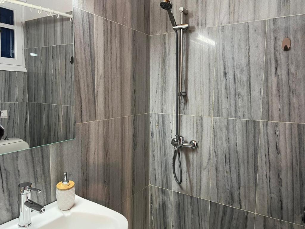 A bathroom at Beachside studio Ornos area