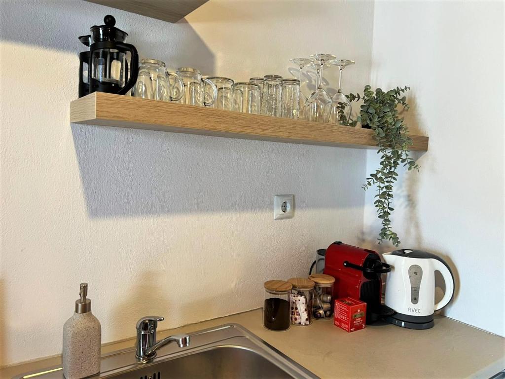 A kitchen or kitchenette at Beachside studio Ornos area