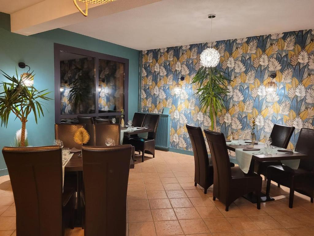 Posezení v ubytování Logis Hôtel Restaurant L'Escapade