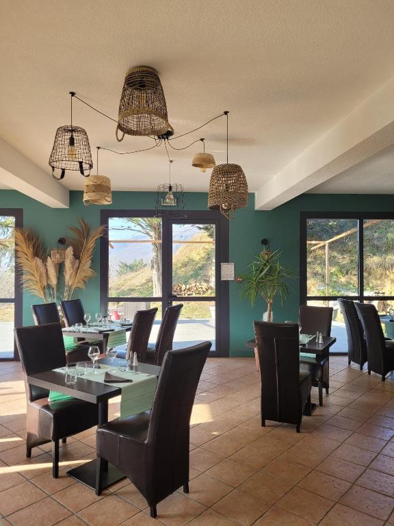 Posezení v ubytování Logis Hôtel Restaurant L'Escapade