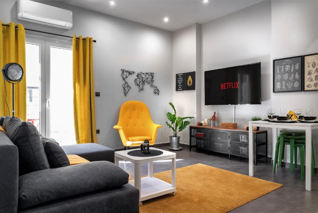 A television and/or entertainment centre at New Apartment in the Heart of Plaka