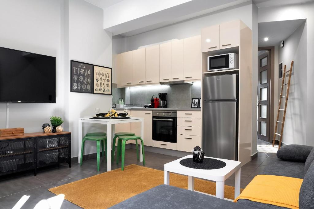 A kitchen or kitchenette at New Apartment in the Heart of Plaka