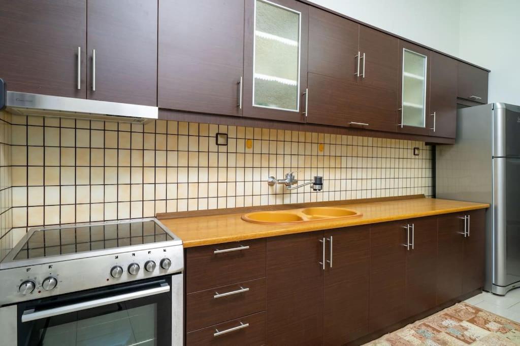 Kuchyň nebo kuchyňský kout v ubytování Olive's House
