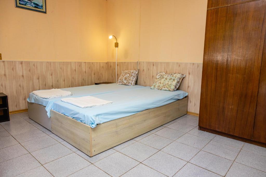 Postel nebo postele na pokoji v ubytování Bungalow Silitur
