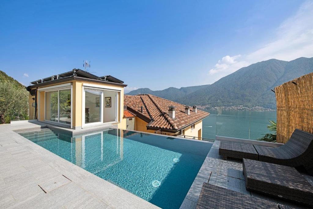 Lago di Como Penthouse with fantastic panoramic lake view, hammam, gym,  private swimming pool and garden, Colonno – opdaterede priser for 2022