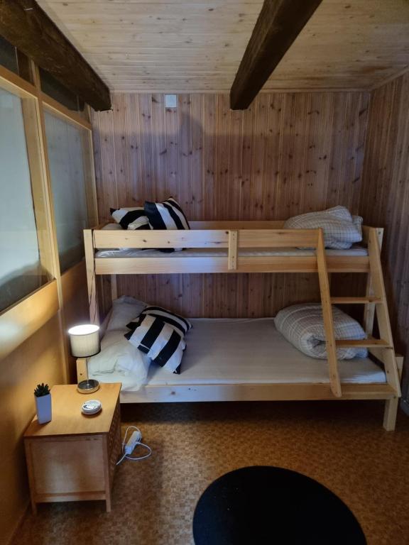 Postel nebo postele na pokoji v ubytování Anhults Garden