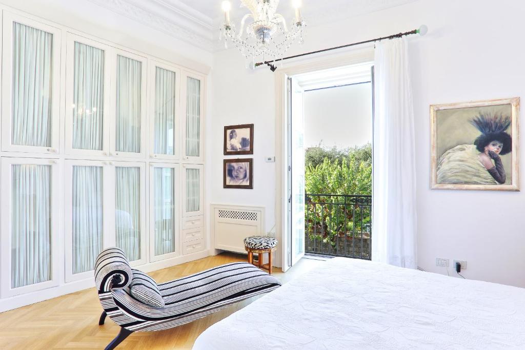 Łóżko lub łóżka w pokoju w obiekcie AMORE RENTALS - Villa Sofia