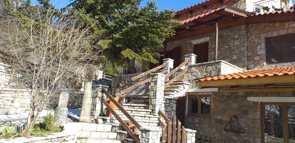 a set of stairs leading to a house at Arachova Houses-Malvina in Arachova