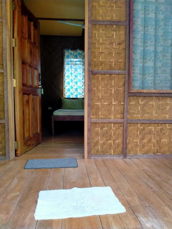 Postel nebo postele na pokoji v ubytování JJS BACKPACKERS VILLAGE