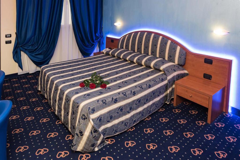 Postel nebo postele na pokoji v ubytování Motel Cuore Gadesco - Hotel - Motel - Cremona - CR