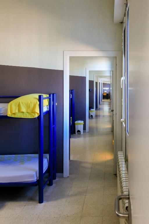 Posteľ alebo postele v izbe v ubytovaní Alberg Coma-ruga Xanascat