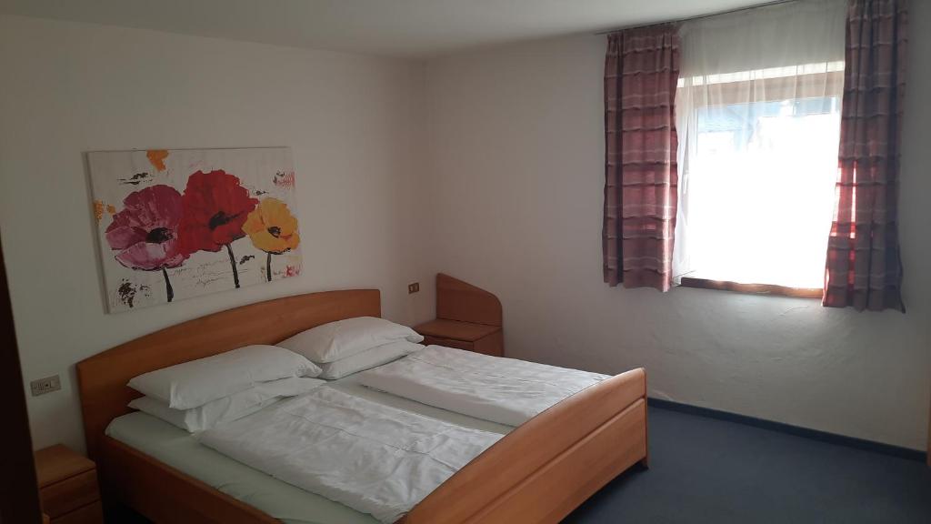 A bed or beds in a room at Villa Rier