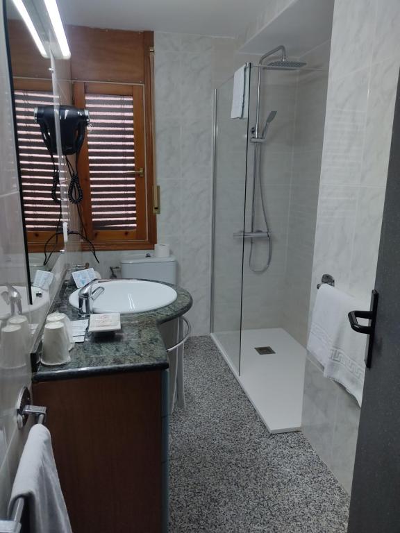 Koupelna v ubytování Hotel Querol