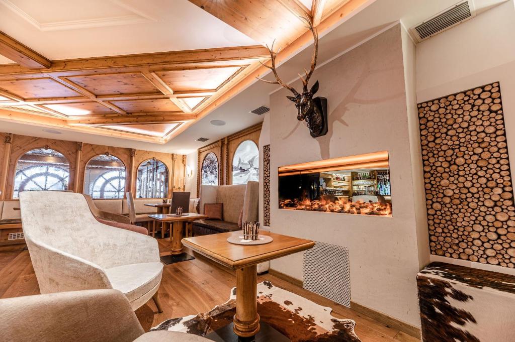 Posezení v ubytování Tevini Dolomites Charming Hotel