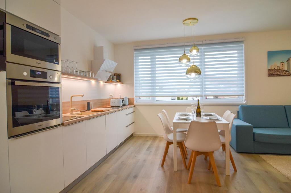 Kuchyň nebo kuchyňský kout v ubytování Apartmán Astrid 4