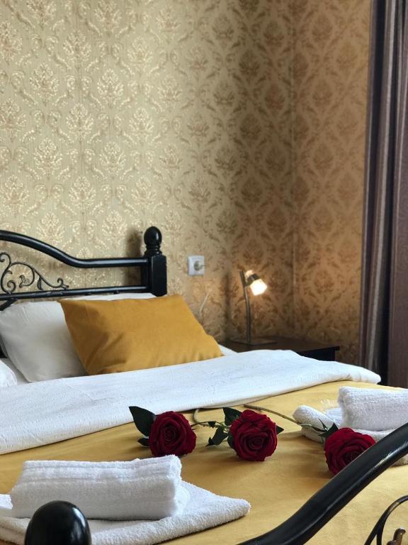 Postel nebo postele na pokoji v ubytování Guest House Elguja Qushashvili