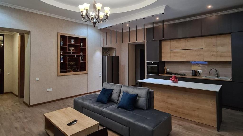 Kuchyň nebo kuchyňský kout v ubytování Nino's Cosy Apartment