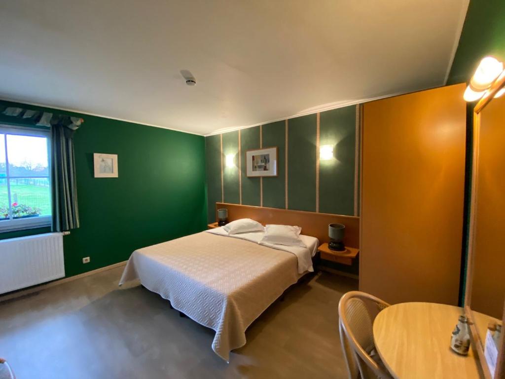 Postel nebo postele na pokoji v ubytování Hotel In Den Hoek