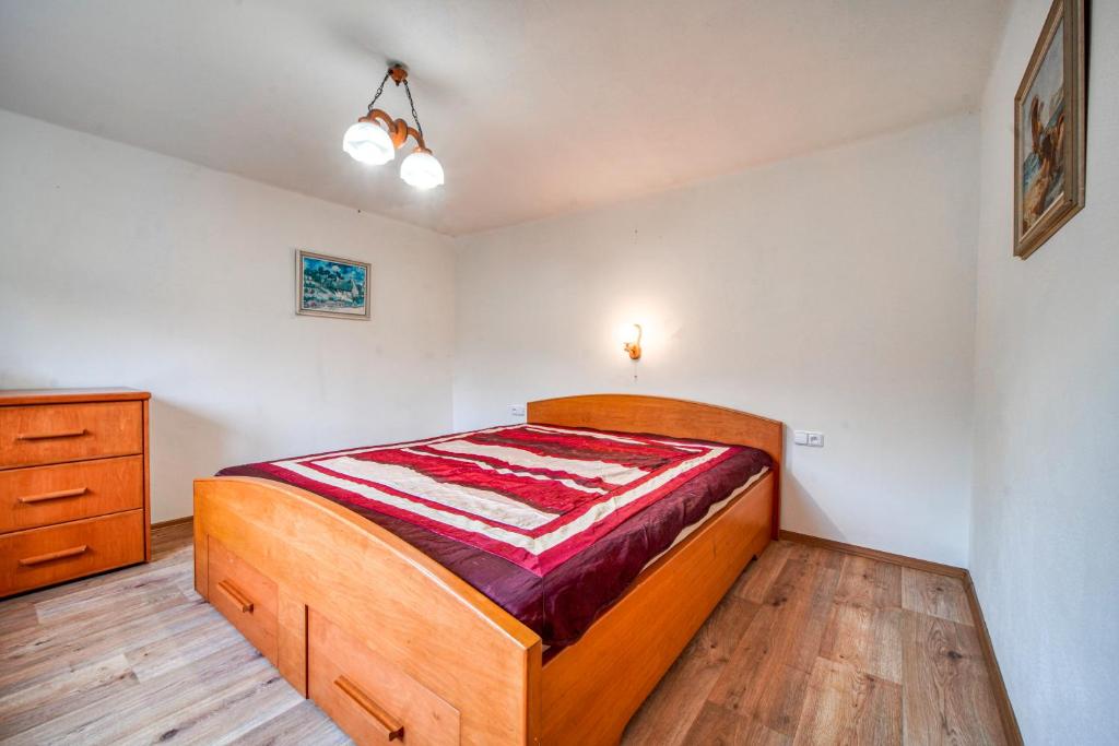 Postel nebo postele na pokoji v ubytování AA Chalupa Šumava