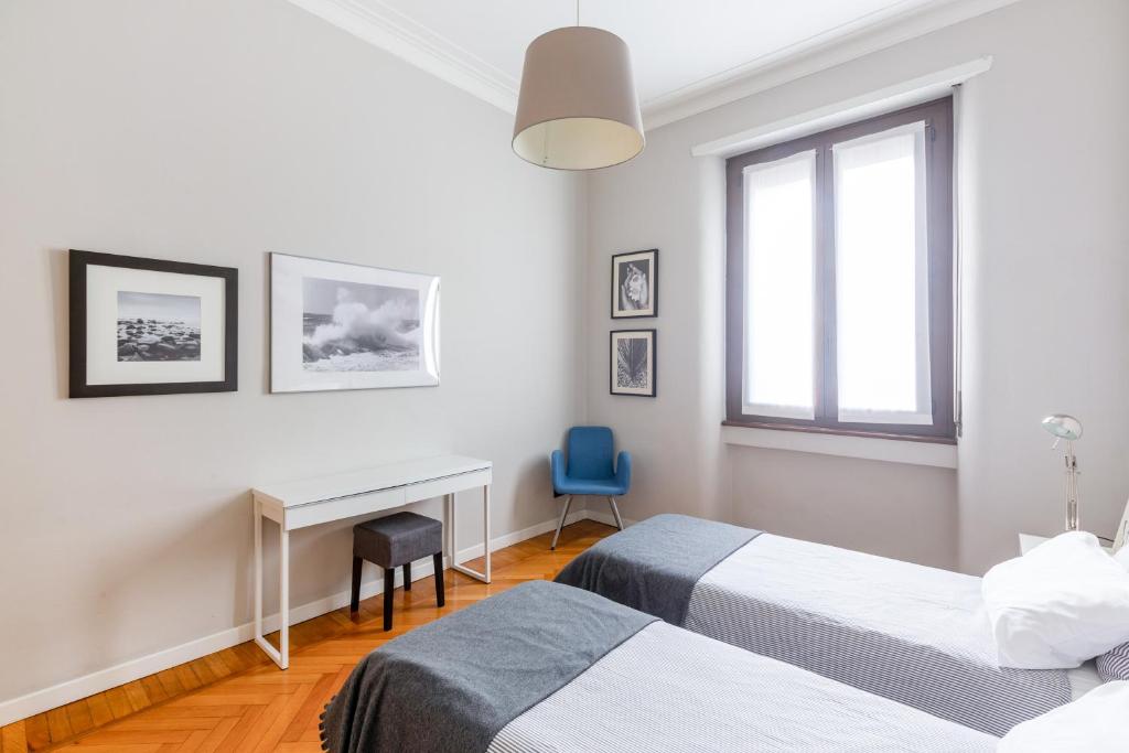 Posteľ alebo postele v izbe v ubytovaní Spacious and brilliant apartment in Duomo by Easylife